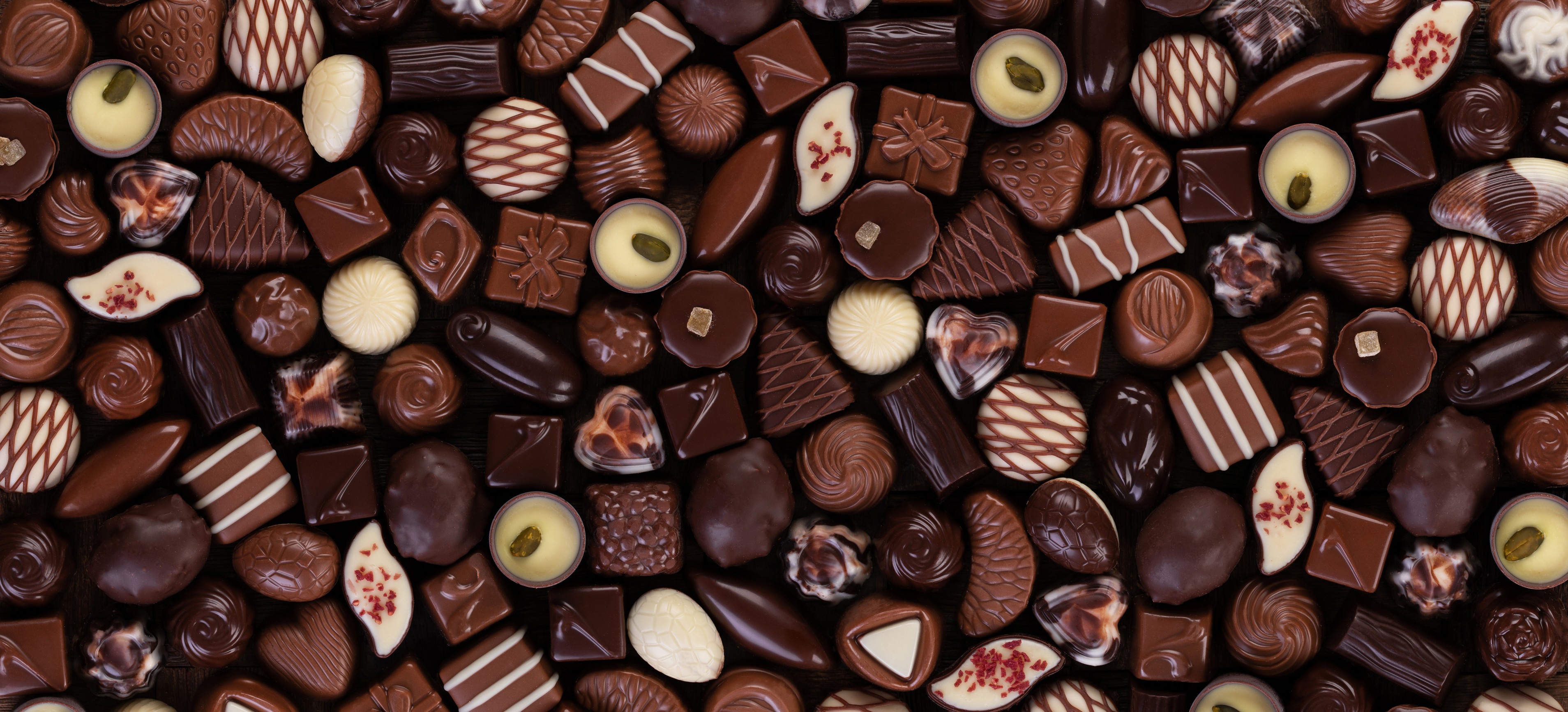 A close up shot of Fresh tasty Chocolate Candies as a background